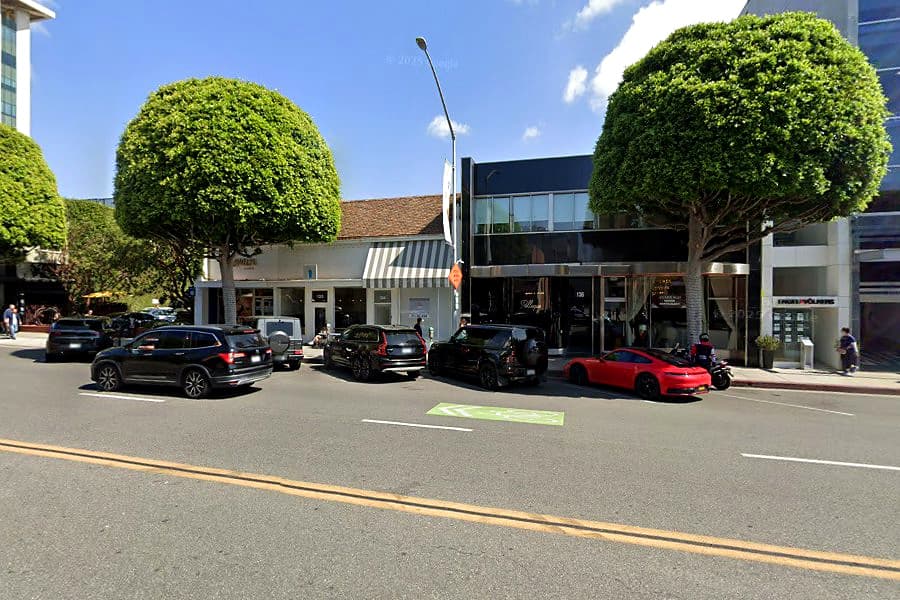 Street-facing exterior of 136 S Beverly Dr; photo enhanced for presentation