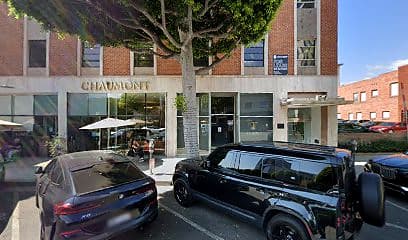 Street-facing exterior of 139 S Beverly Dr; photo enhanced for presentation