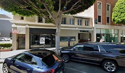 Street-facing exterior of 153-159 S Beverly Dr; photo enhanced for presentation