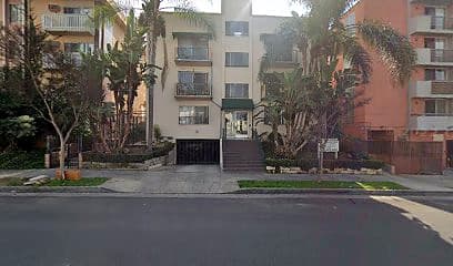 Street-facing exterior of 3840 Ingraham St; photo enhanced for presentation