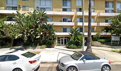Street-facing exterior of 430 S St Andrews Pl; photo enhanced for presentation