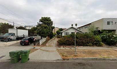 Street-facing exterior of 4852 Rosewood Ave; photo enhanced for presentation