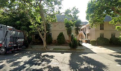 Street-facing exterior of 545 N Rossmore Ave; photo enhanced for presentation