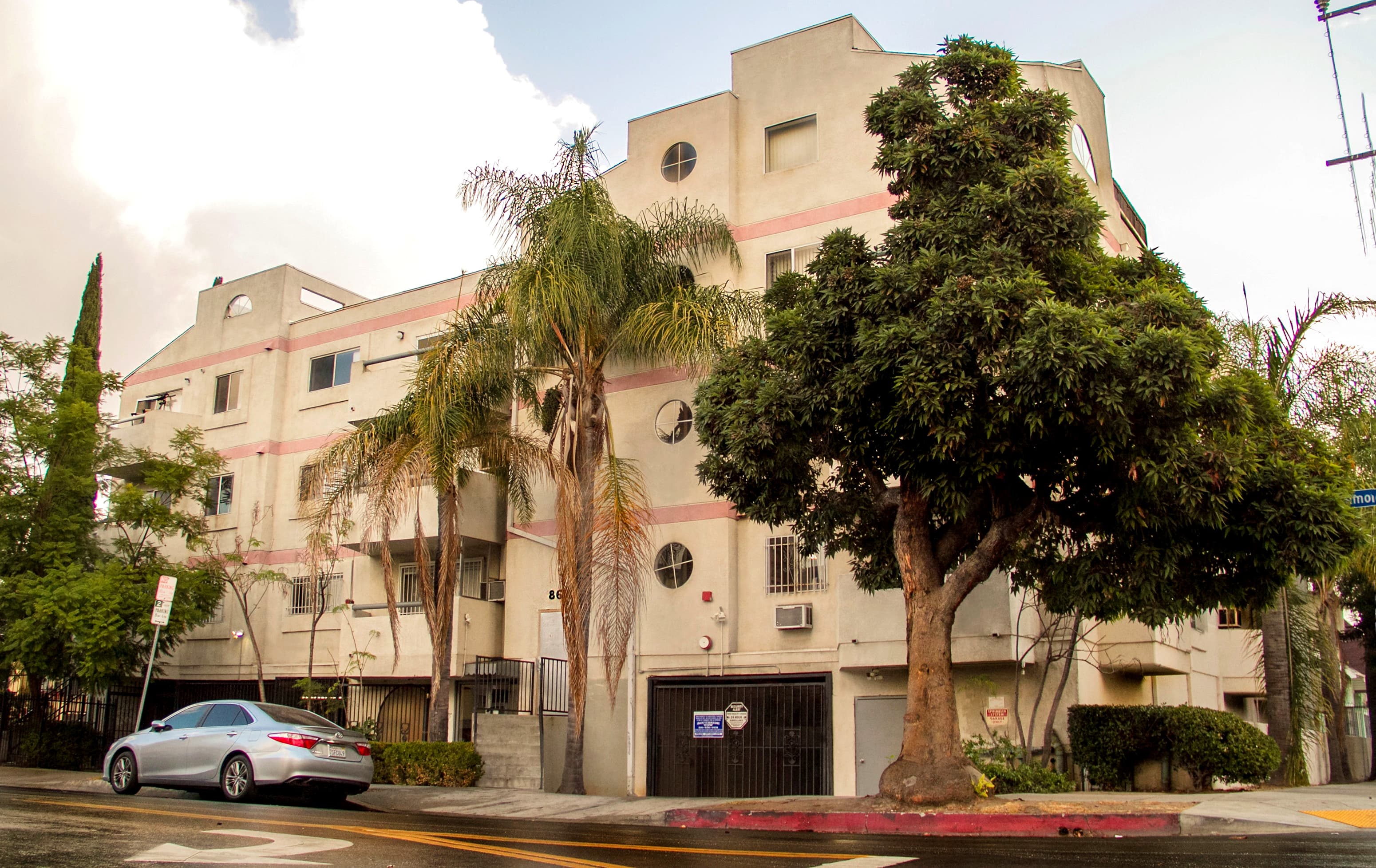 Street-facing exterior of 860 S Ardmore Ave; photo enhanced for presentation